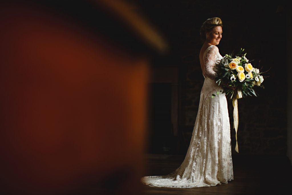 Beautiful bride with yellow bouquet Nadia Di Tullio Flowers